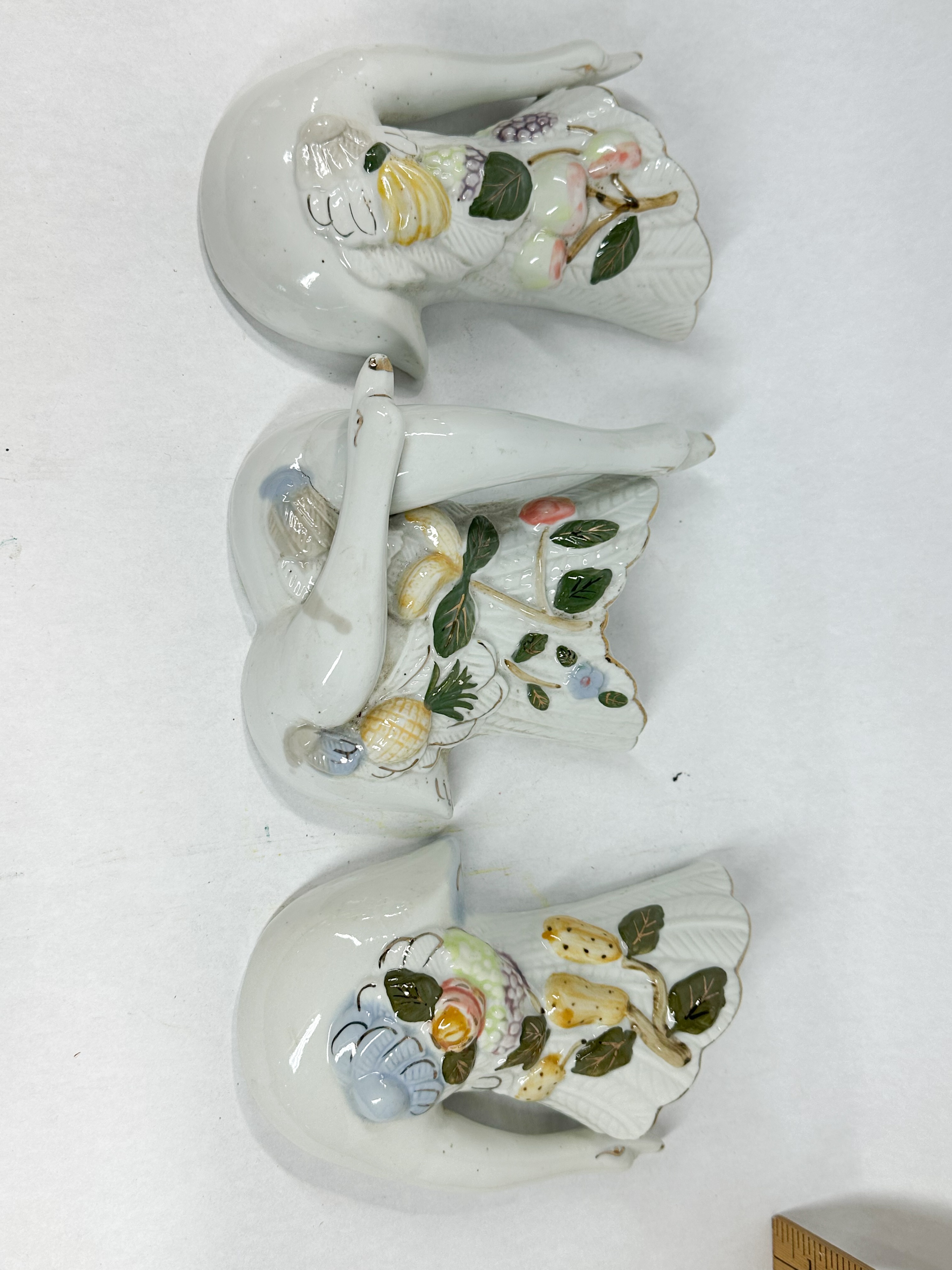 TRIO OF POLYCHROME FRUIT CERAMIC WALL POCKETS