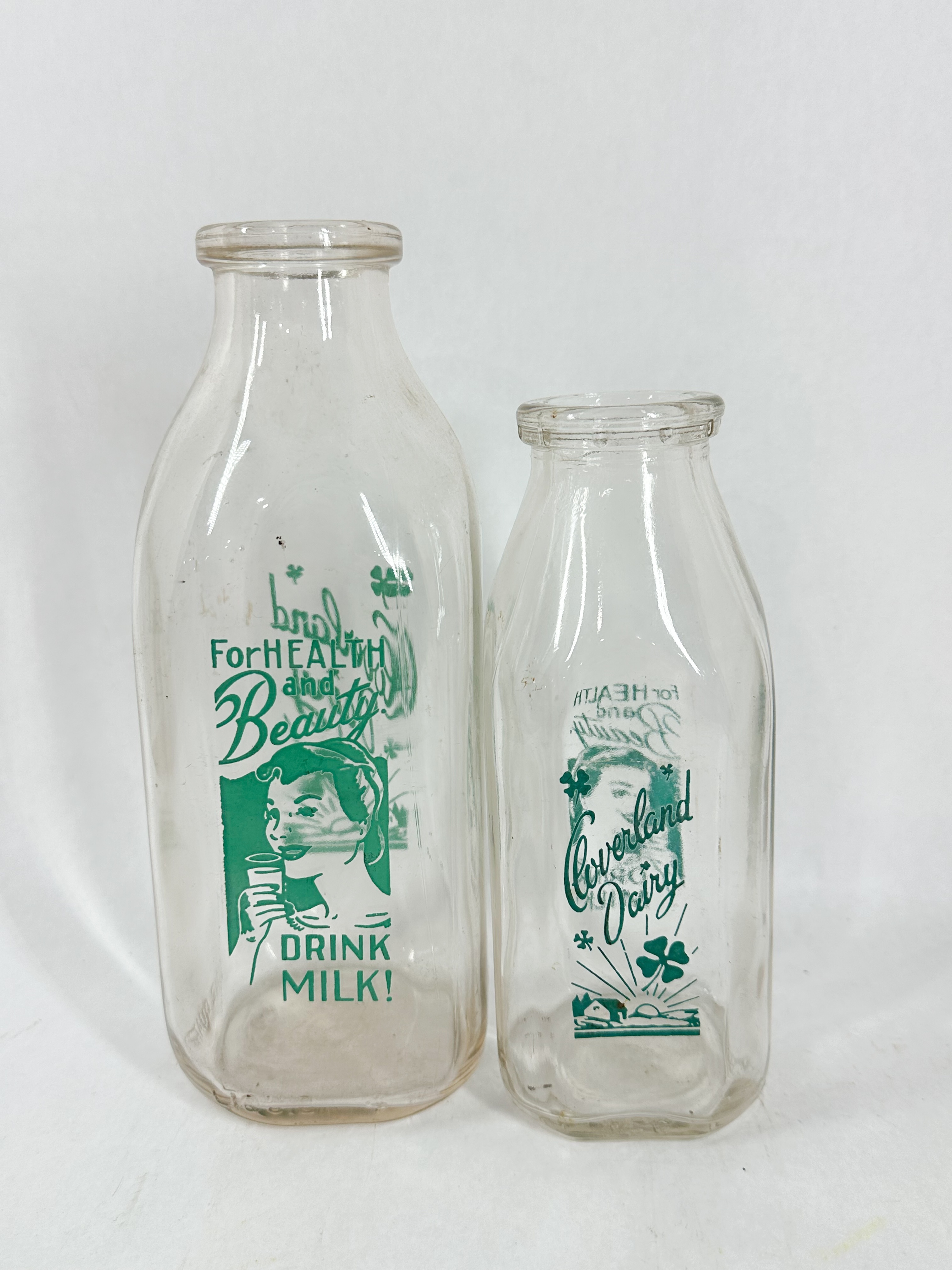 CLOVERLAND DAIRY GLASS BOTTLE PAIR