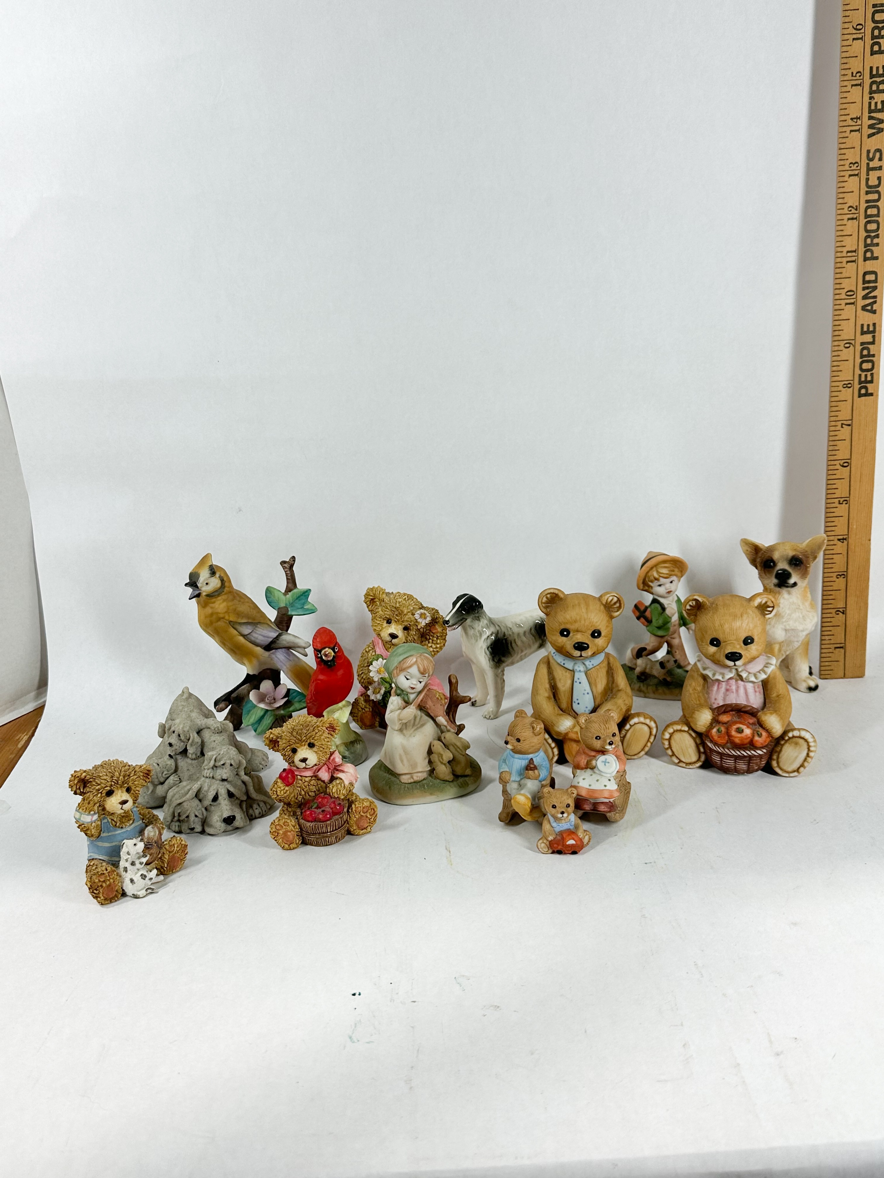 COLLECTION OF CERAMIC AND RESIN ANIMAL FIGURINES