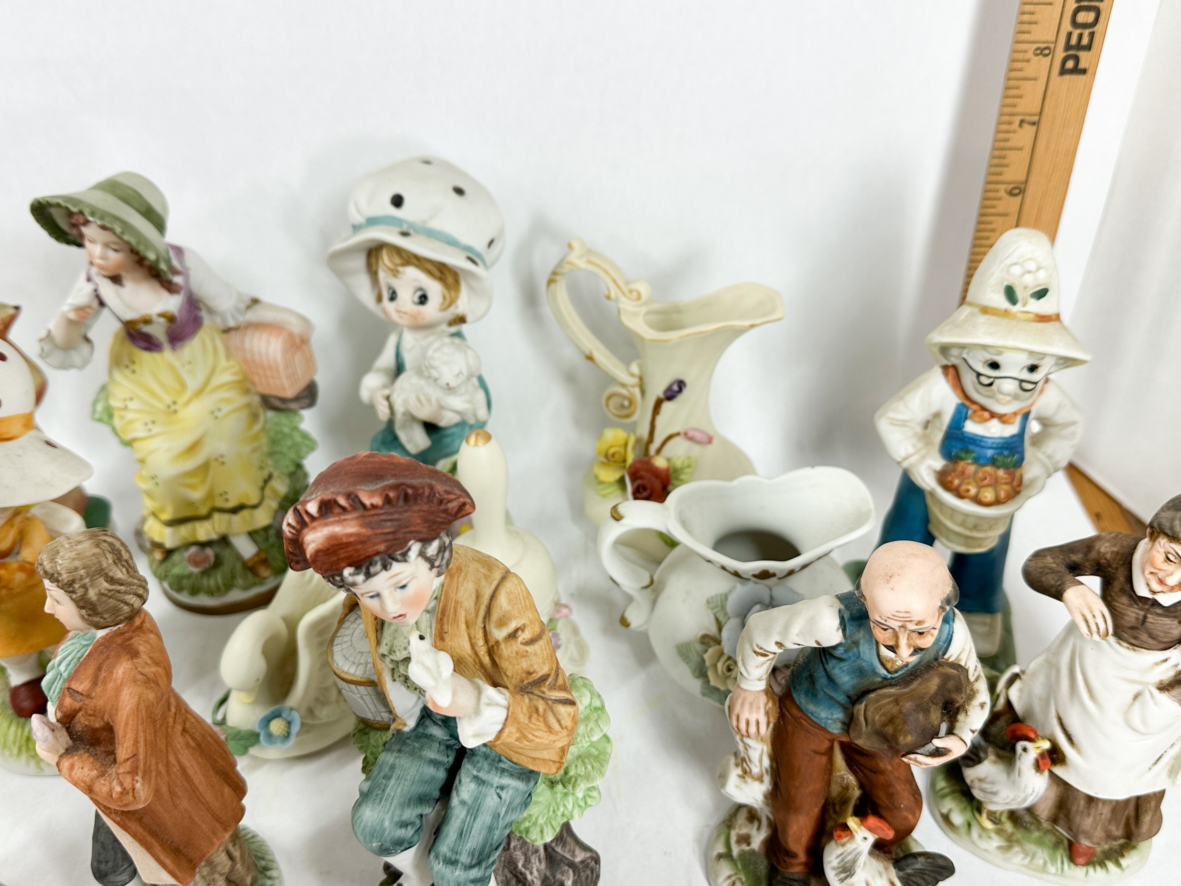 ASSORTED CERAMIC AND PORCELAIN FIGURINES COLLECTION