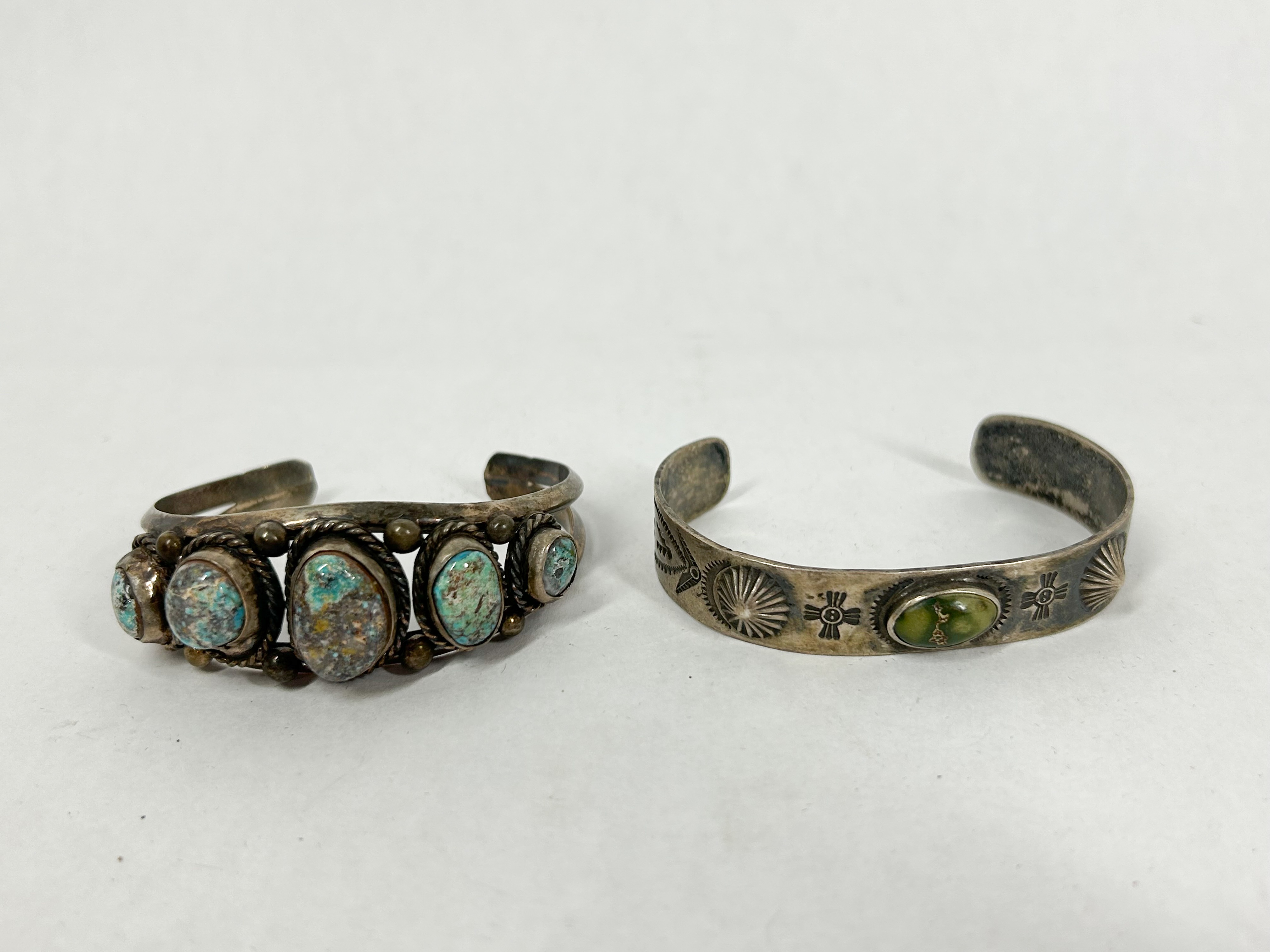 TWO SOUTHWEST STYLE SILVER AND TURQUOISE CUFF BRACELETS