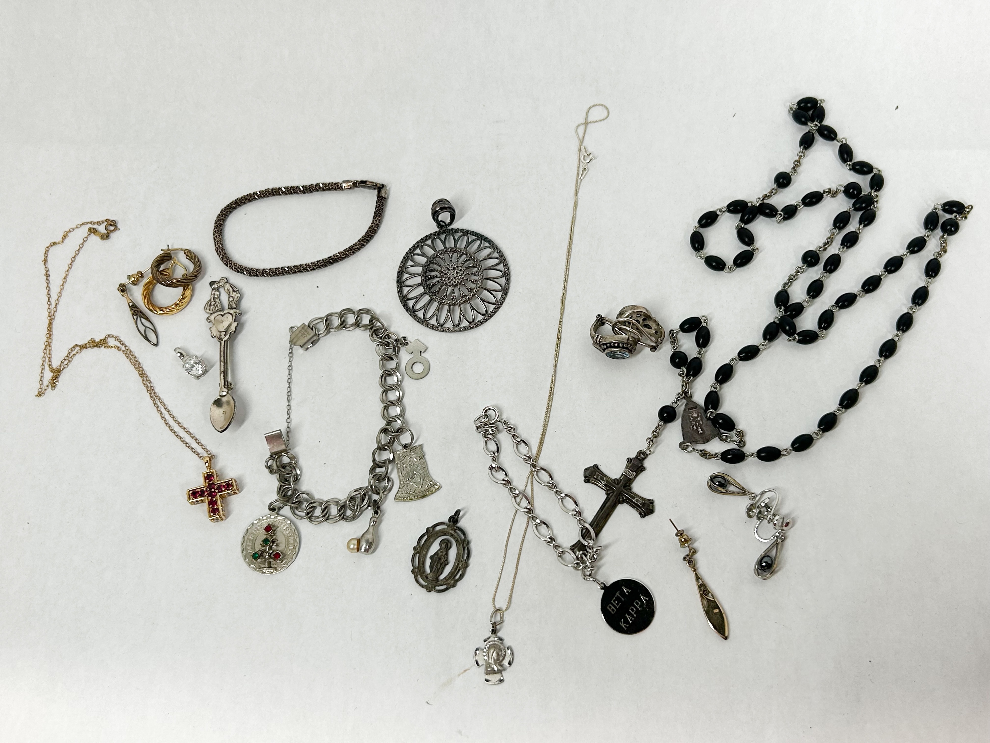 COLLECTION OF SILVER AND RELIGIOUS JEWELRY