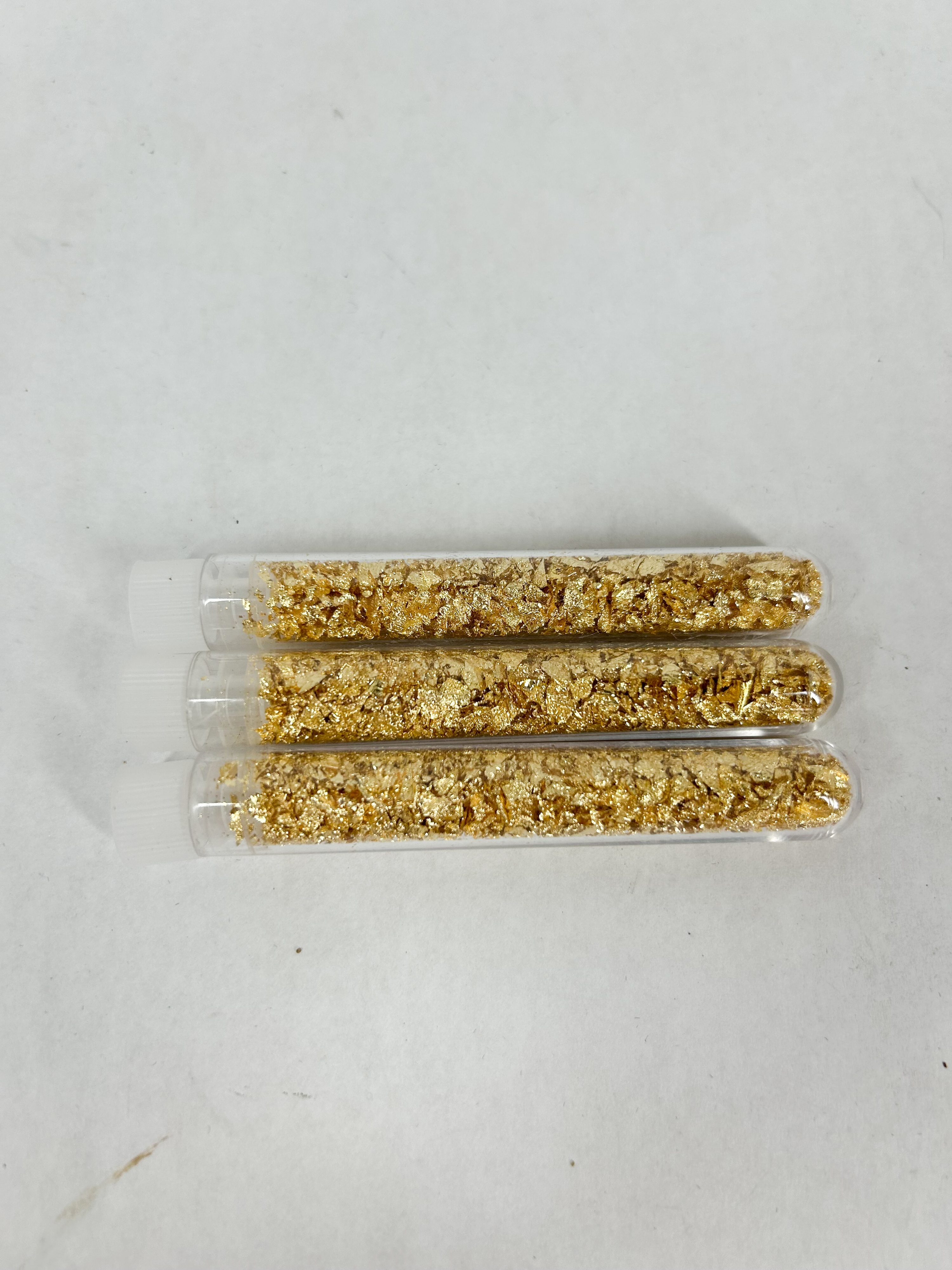 THREE GOLD FLAKES