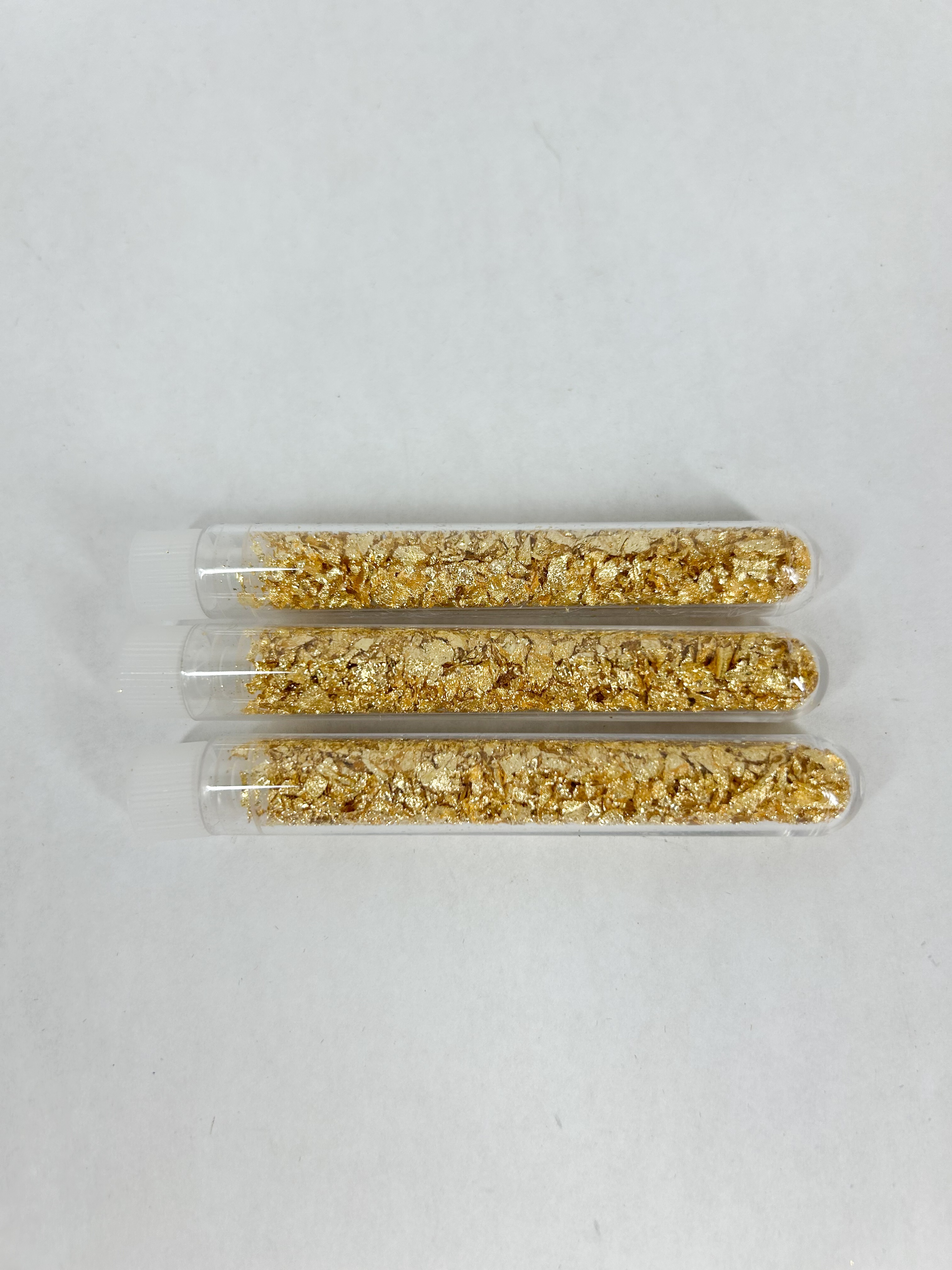 THREE GOLD FLAKES