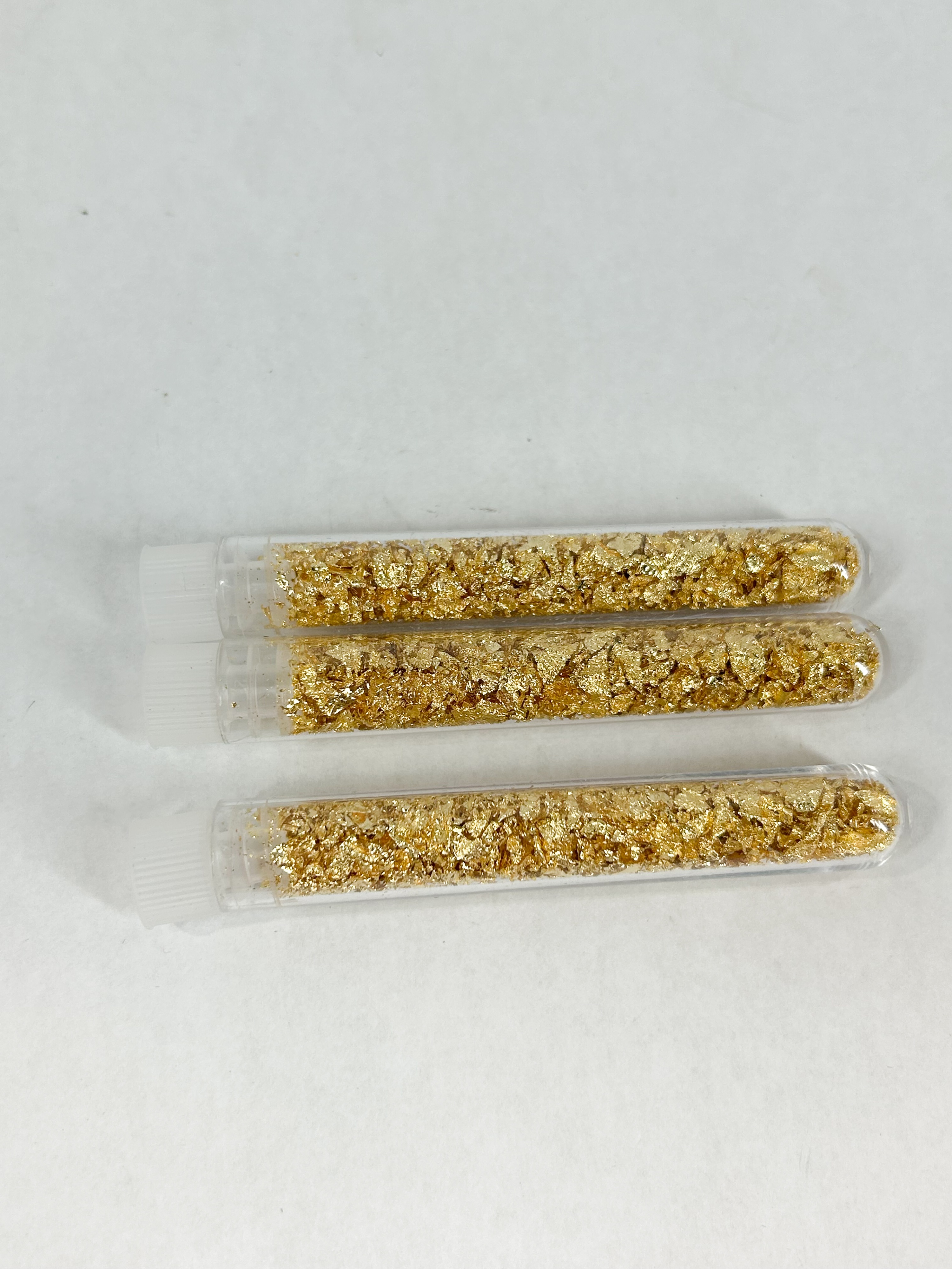 THREE GOLD FLAKES