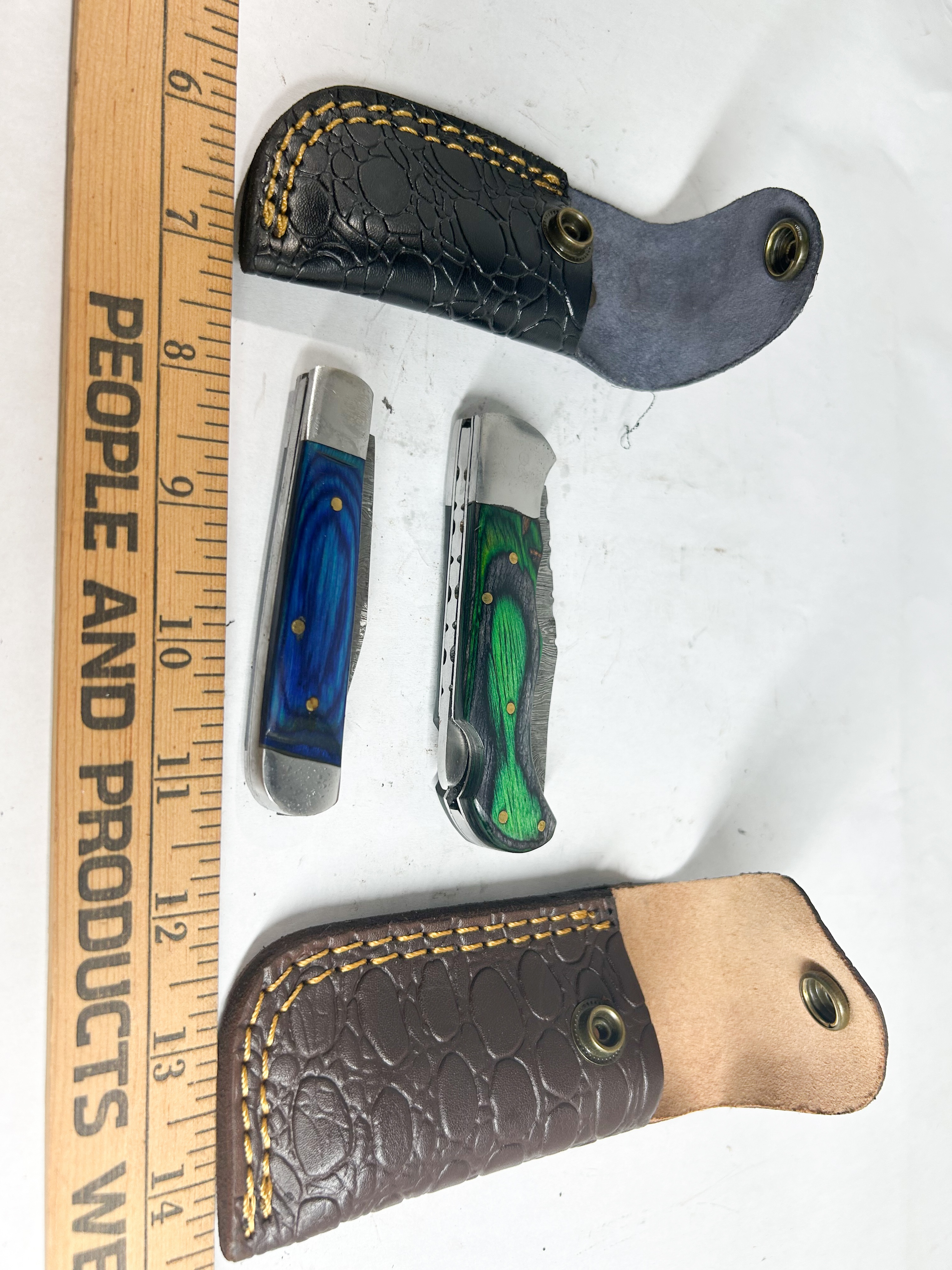 TWO DAMASCUS STEEL FOLDING POCKET KNIVES