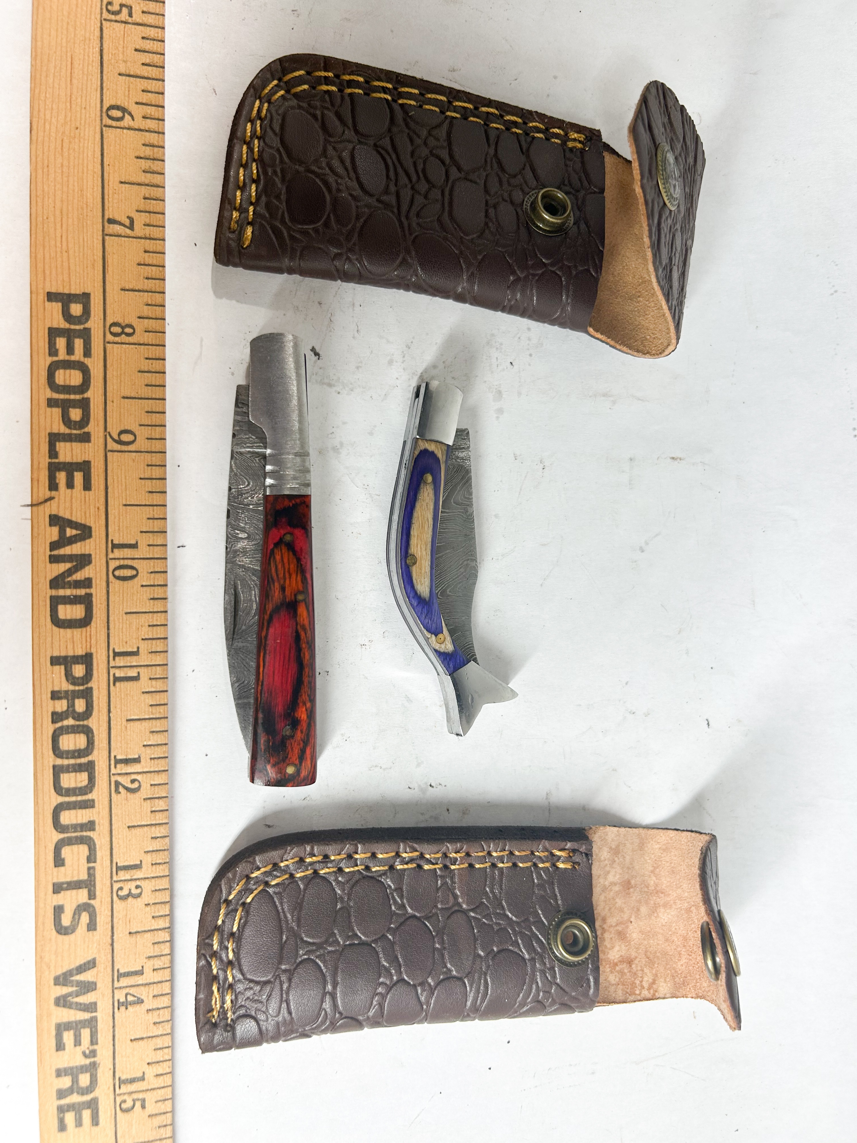 TWO DAMASCUS STEEL FOLDING POCKET KNIVES