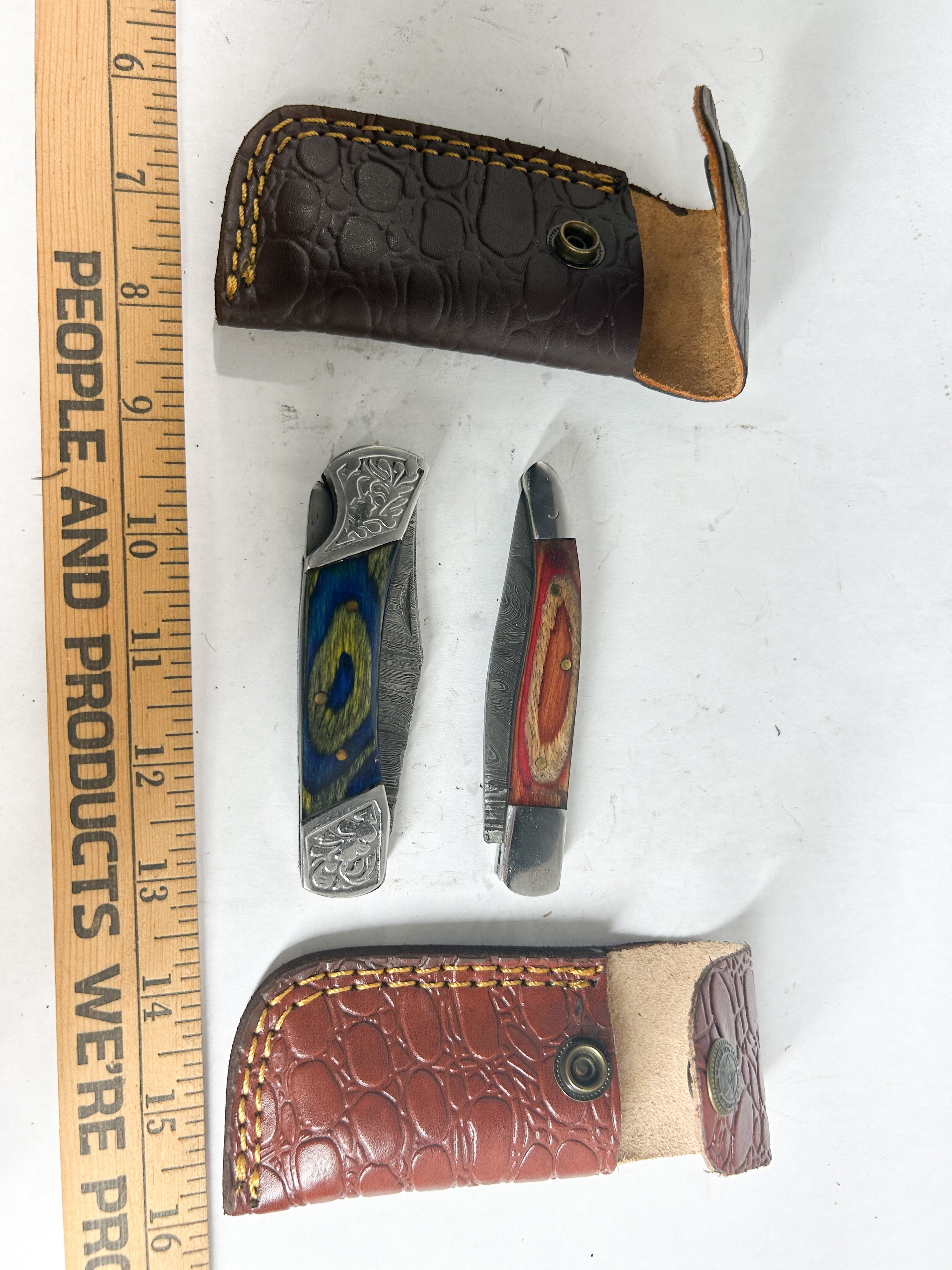 TWO DAMASCUS STEEL FOLDING POCKET KNIVES