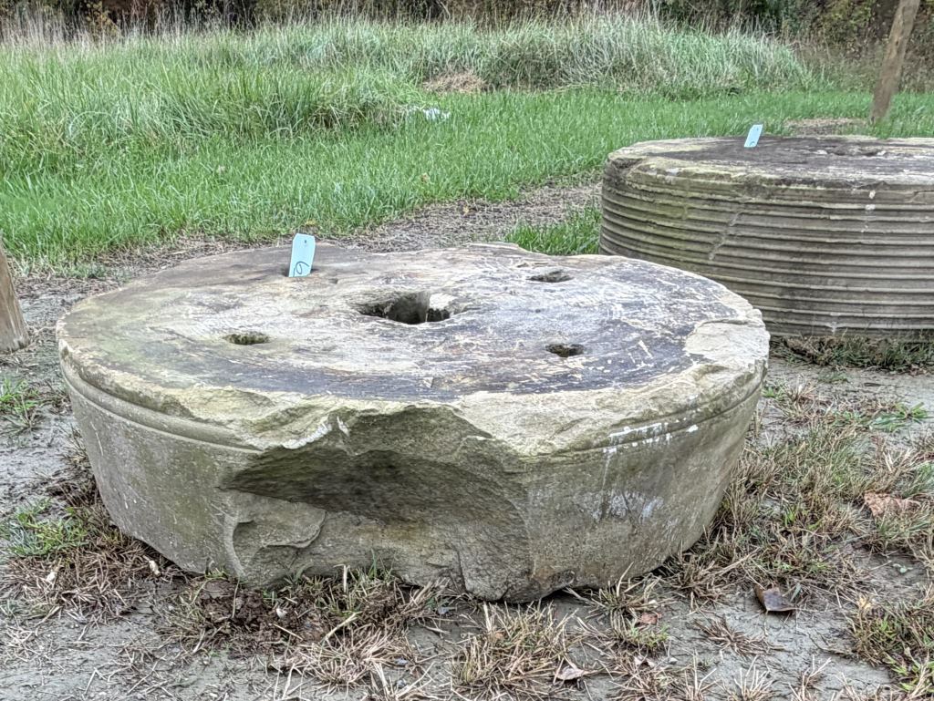 ANTIQUE MILLING STONE