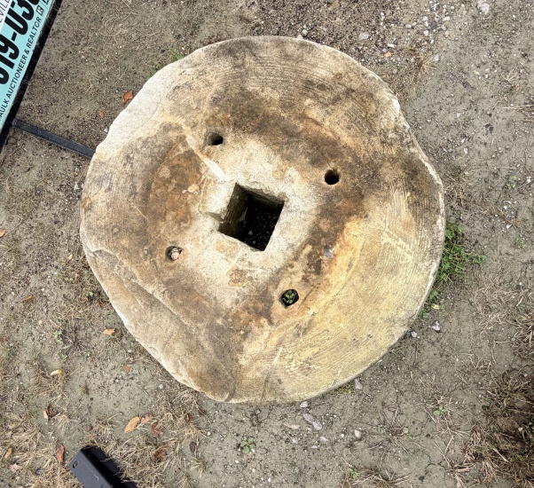 ANTIQUE MILLING STONE