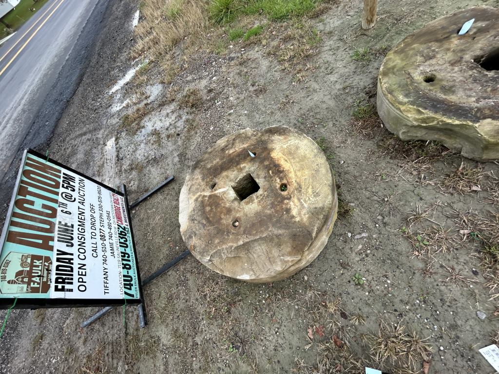 ANTIQUE MILLING STONE