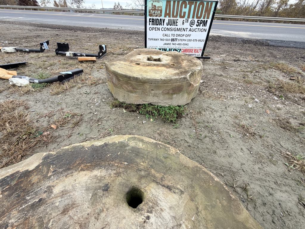 ANTIQUE MILLING STONE