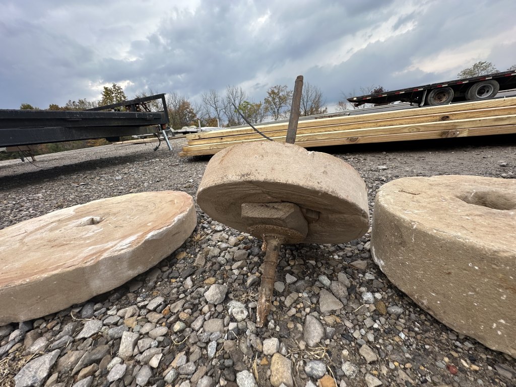 ANTIQUE MILLING STONE