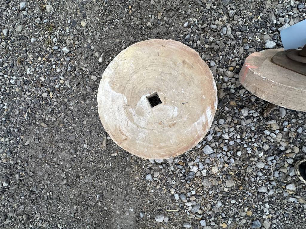 ANTIQUE MILLING STONE
