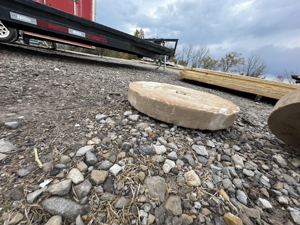 ANTIQUE MILLING STONE