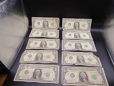 10- 1963 B Green Seal $1 Federal Reserve Notes with the signature of Joseph Barr and Katherine 