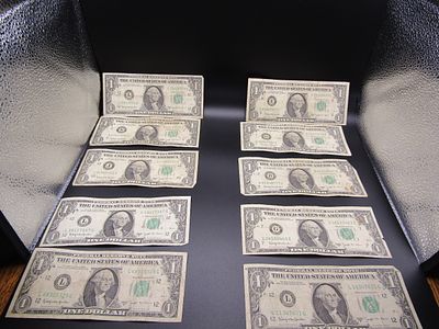 10- 1963 B Green Seal $1 Federal Reserve Notes with the signature of Joseph Barr and Katherine 