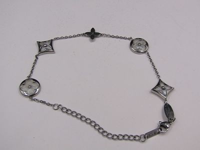 Louis Vuitton Paris Sterling Silver Blossom Designer Bracelet Condition Yes, we will ship this 