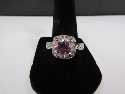 Size 9 Sterling Silver Pink Topaz Ring Condition Yes, we will ship this item, we provide in 