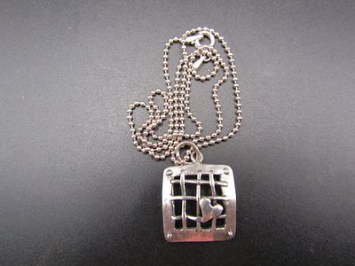 Sterling Silver Square Cage Pendant w/Small Heart on 18" Sterling Silver Chain. Condition Yes 