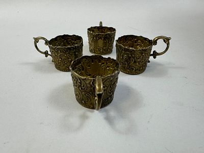 [Европа, нач. ХХ в. Ручная работа] Четыре серебряных миниатюрных подстаканника с золочением. С 