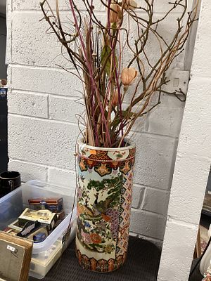 Large oriental pot with dried flowers