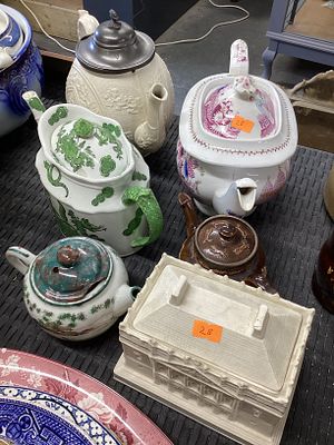 5 teapots and tea caddy