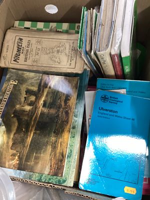 Box of books and maps