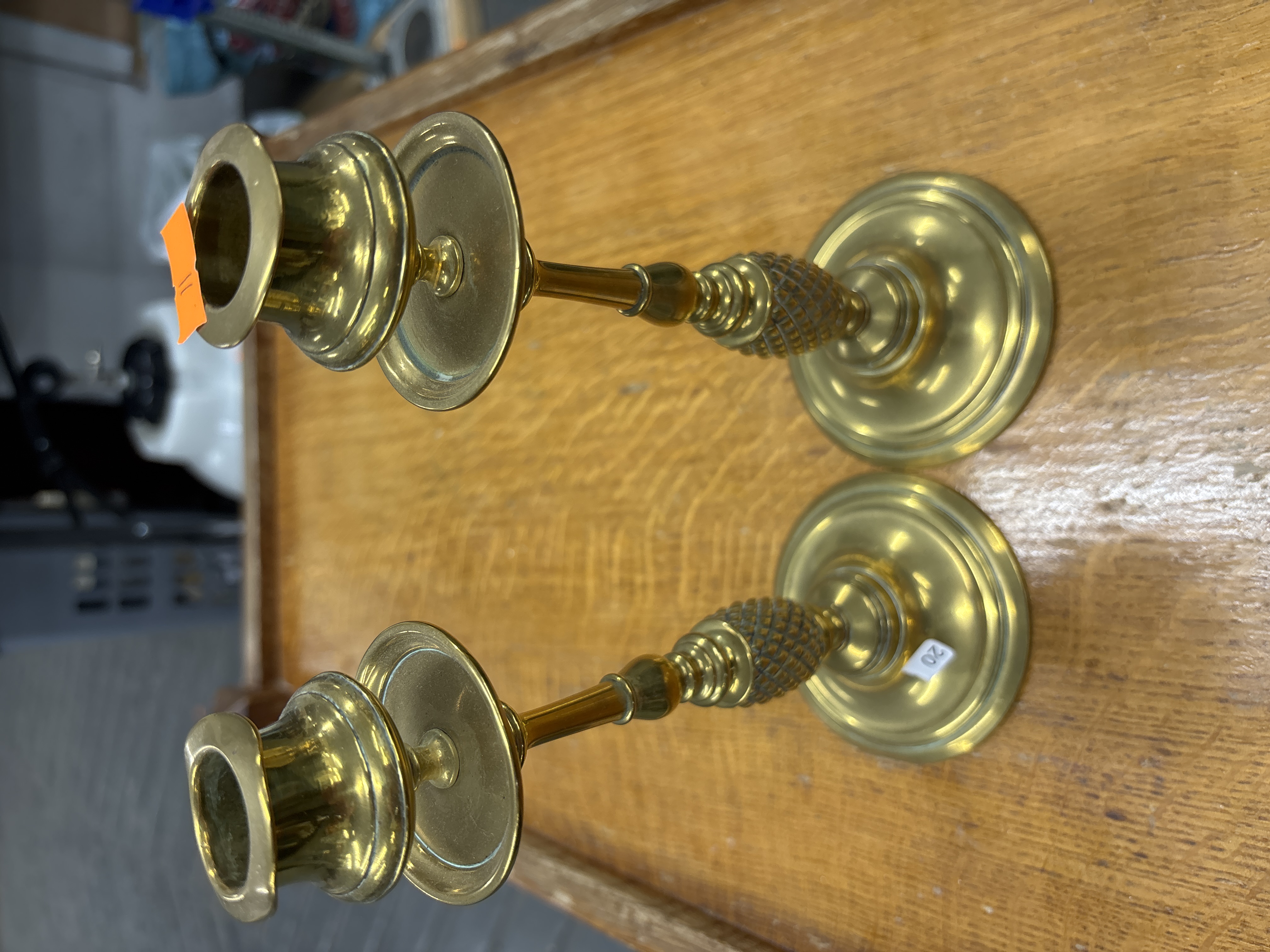 A Pair of Brass Candlesticks with Pineapple Knops