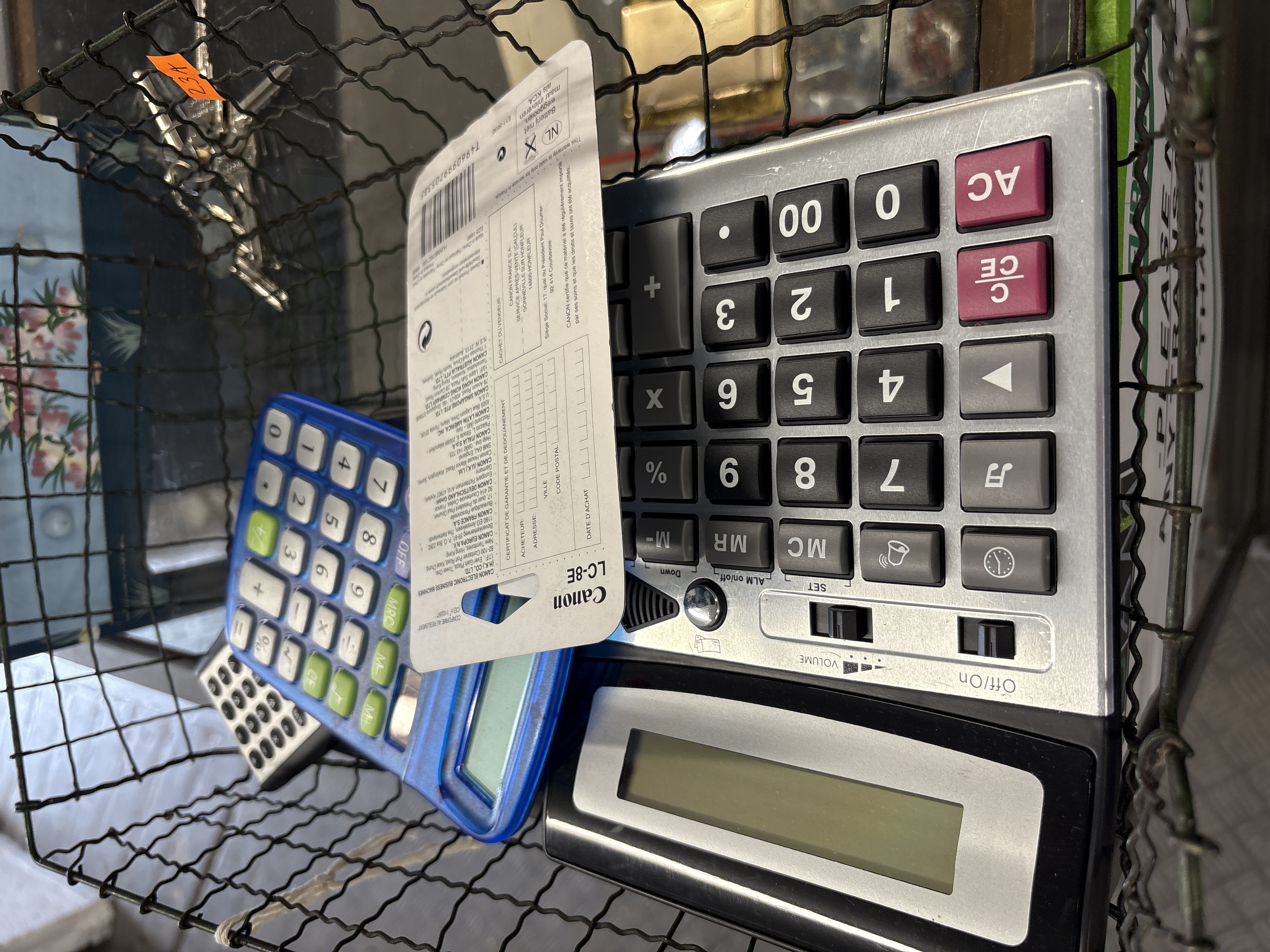 A Group of Electronic Calculators Including a Canon LC-8E