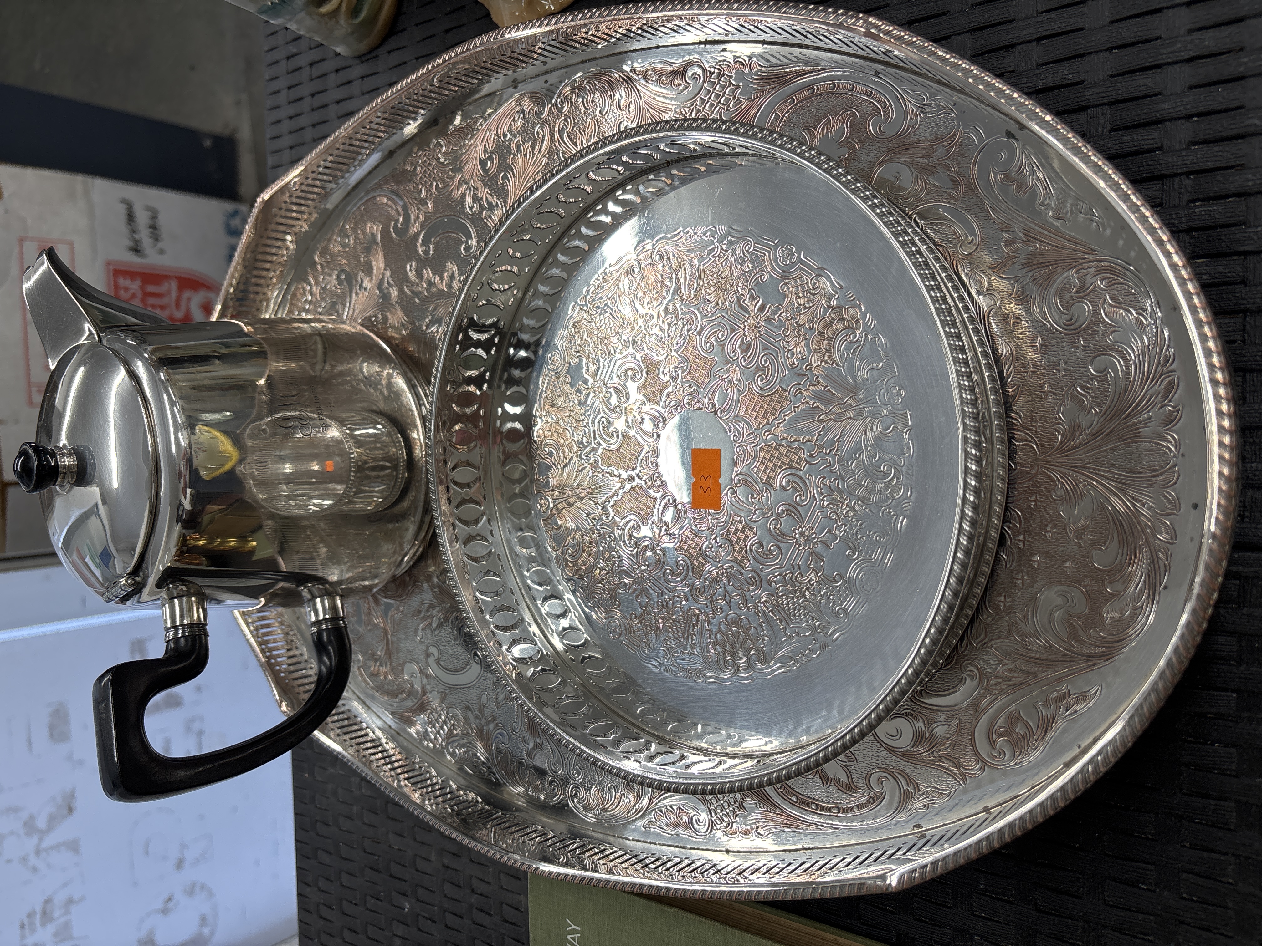 A Trio of Silver-Plated Serving Items Including a Coffee Pot and Two Trays