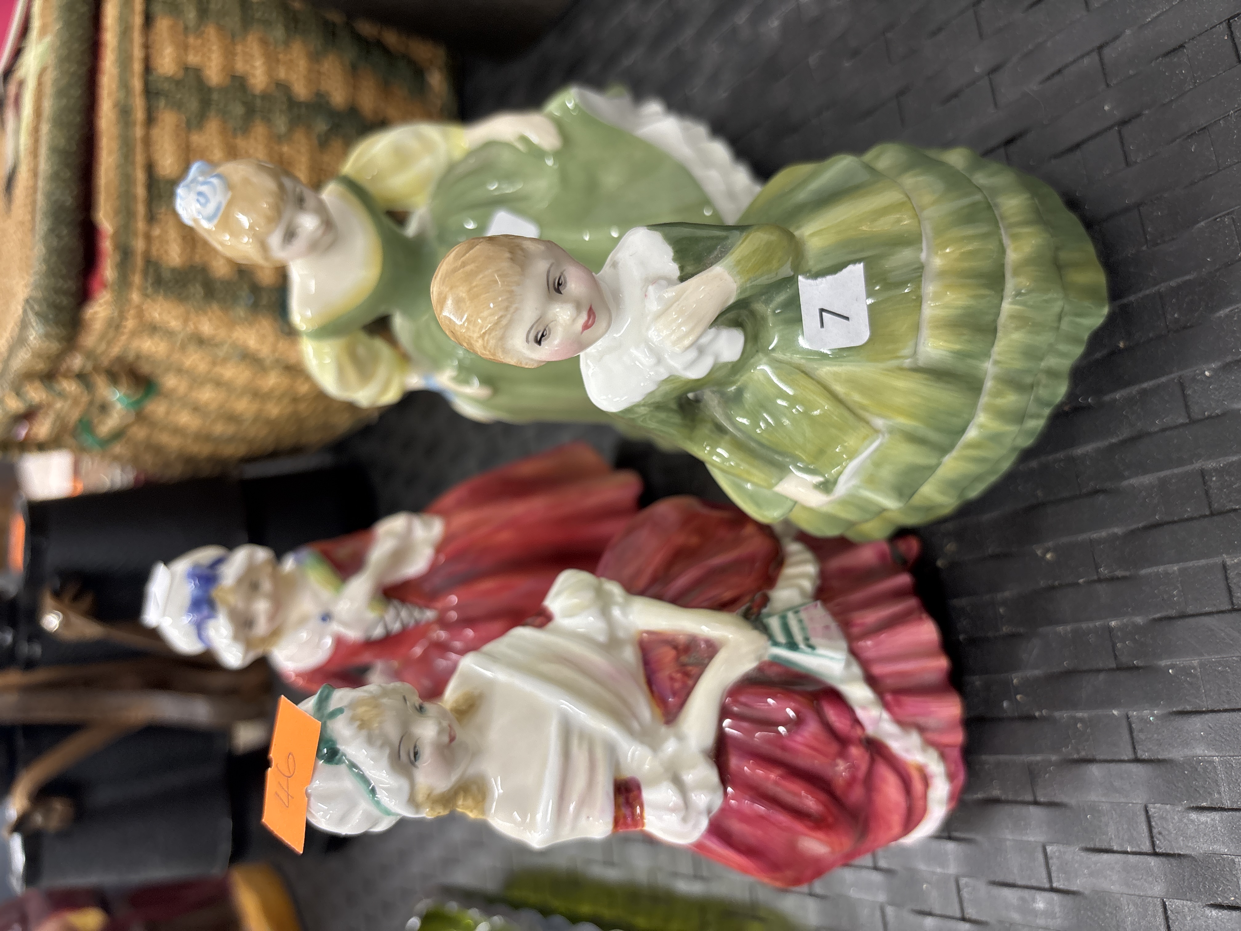 A Collection of Four Royal Doulton Bone China Figurines