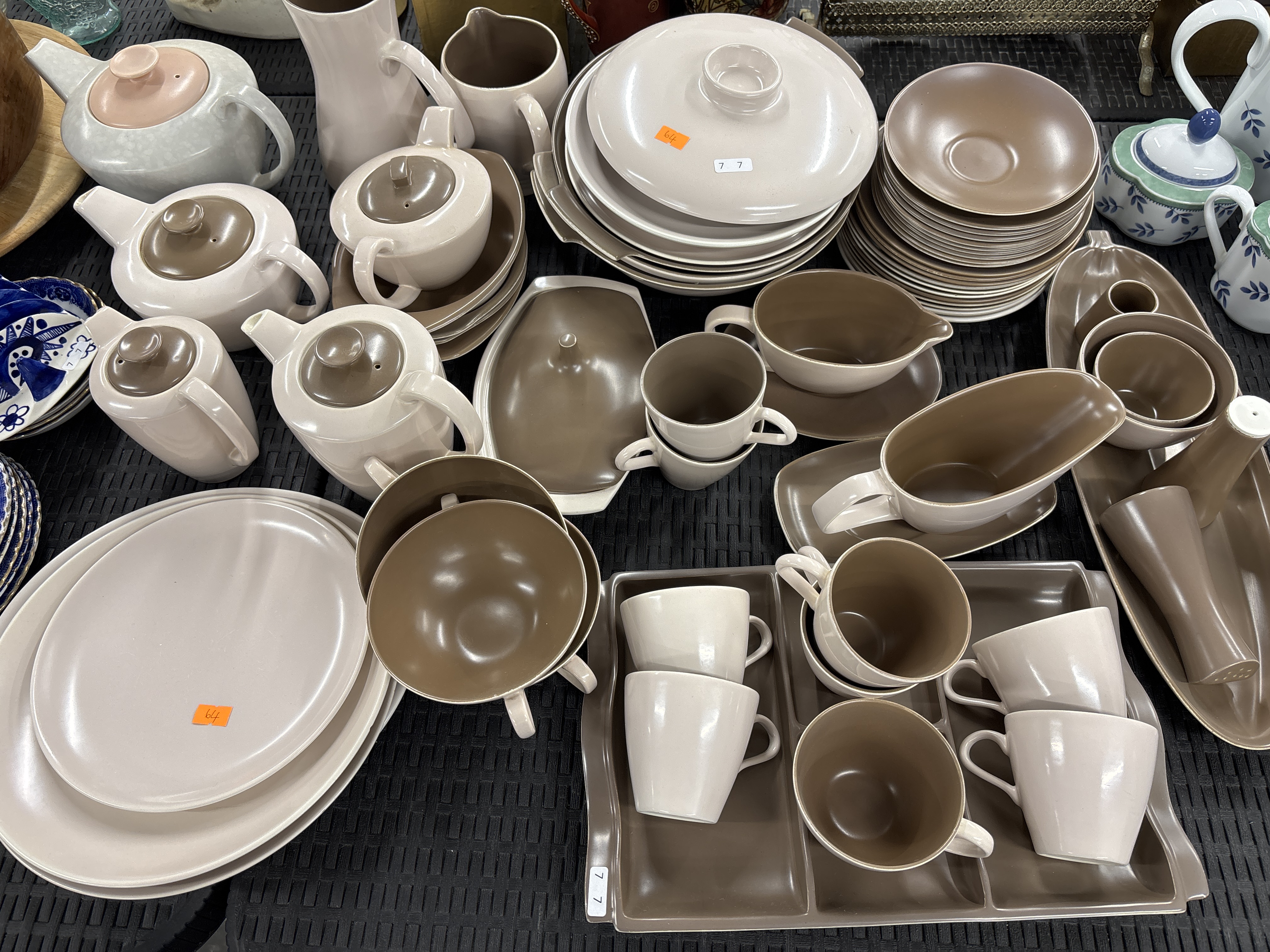 A Large Collection of Poole Pottery Twintone Tableware in Sepia and Mushroom Colourway