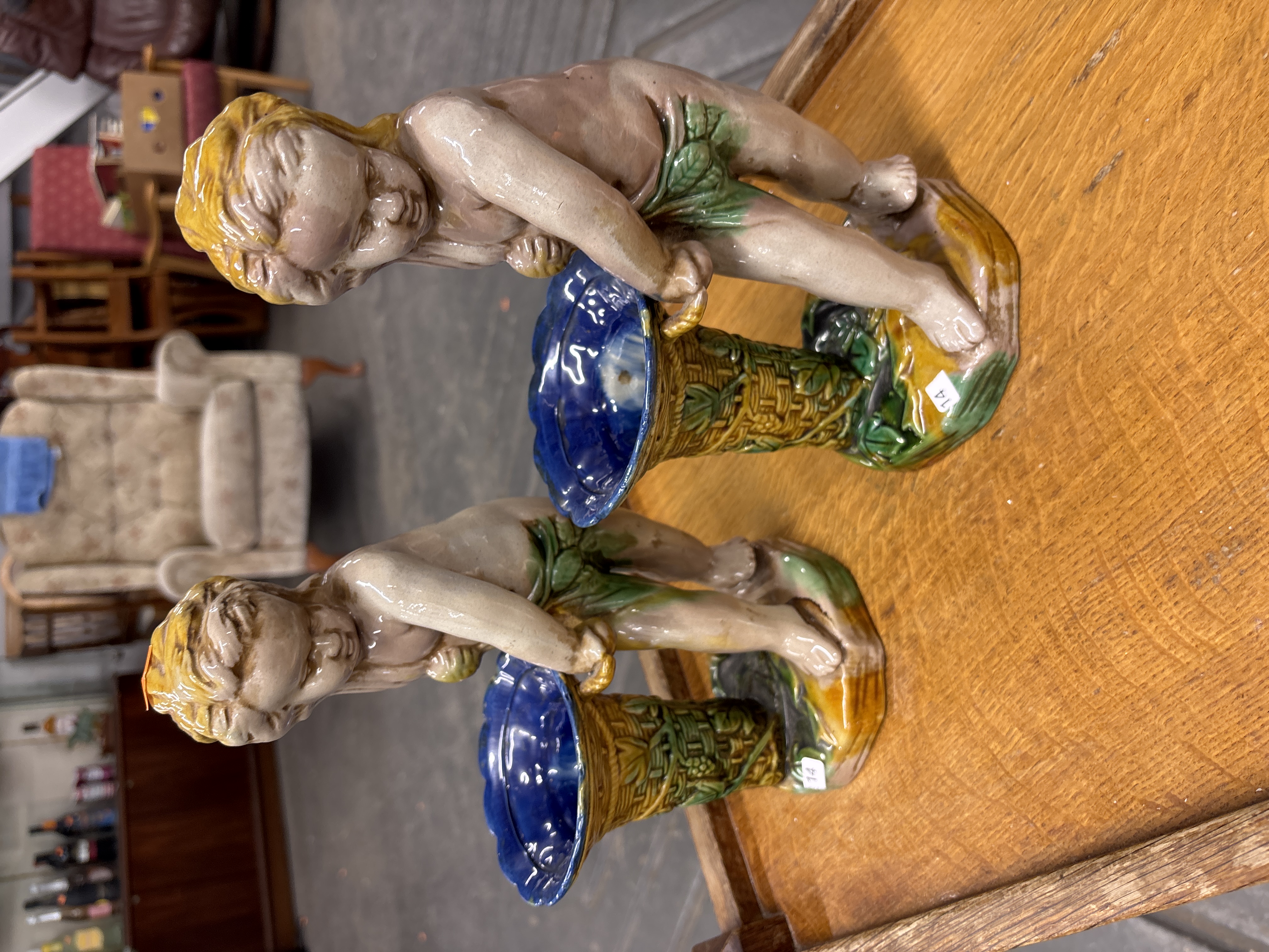 A Pair of Victorian Majolica Putto Spill Holders