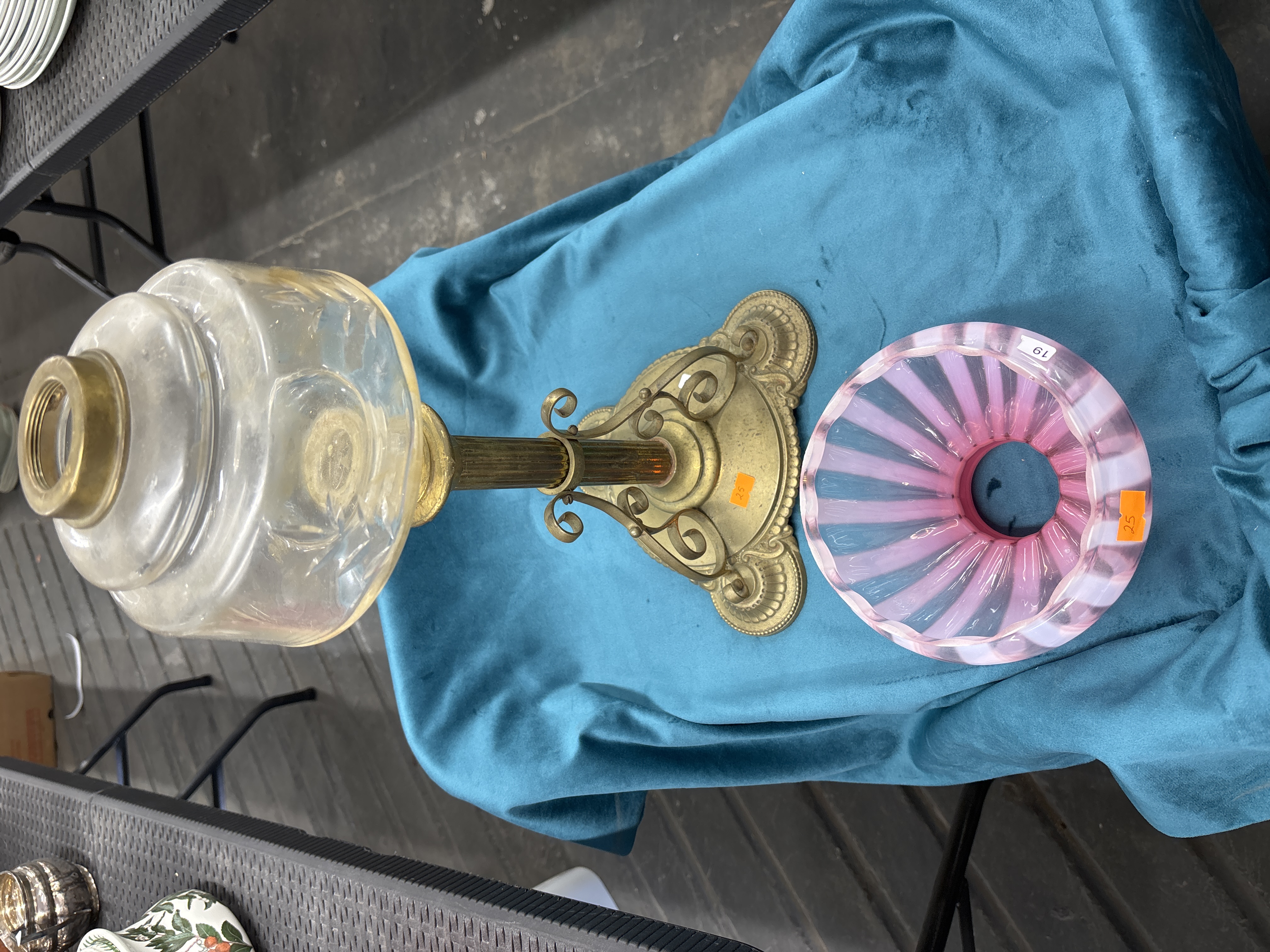 A Victorian Style Brass and Clear Glass Oil Lamp Base with a Pink and White Striped Glass Shade