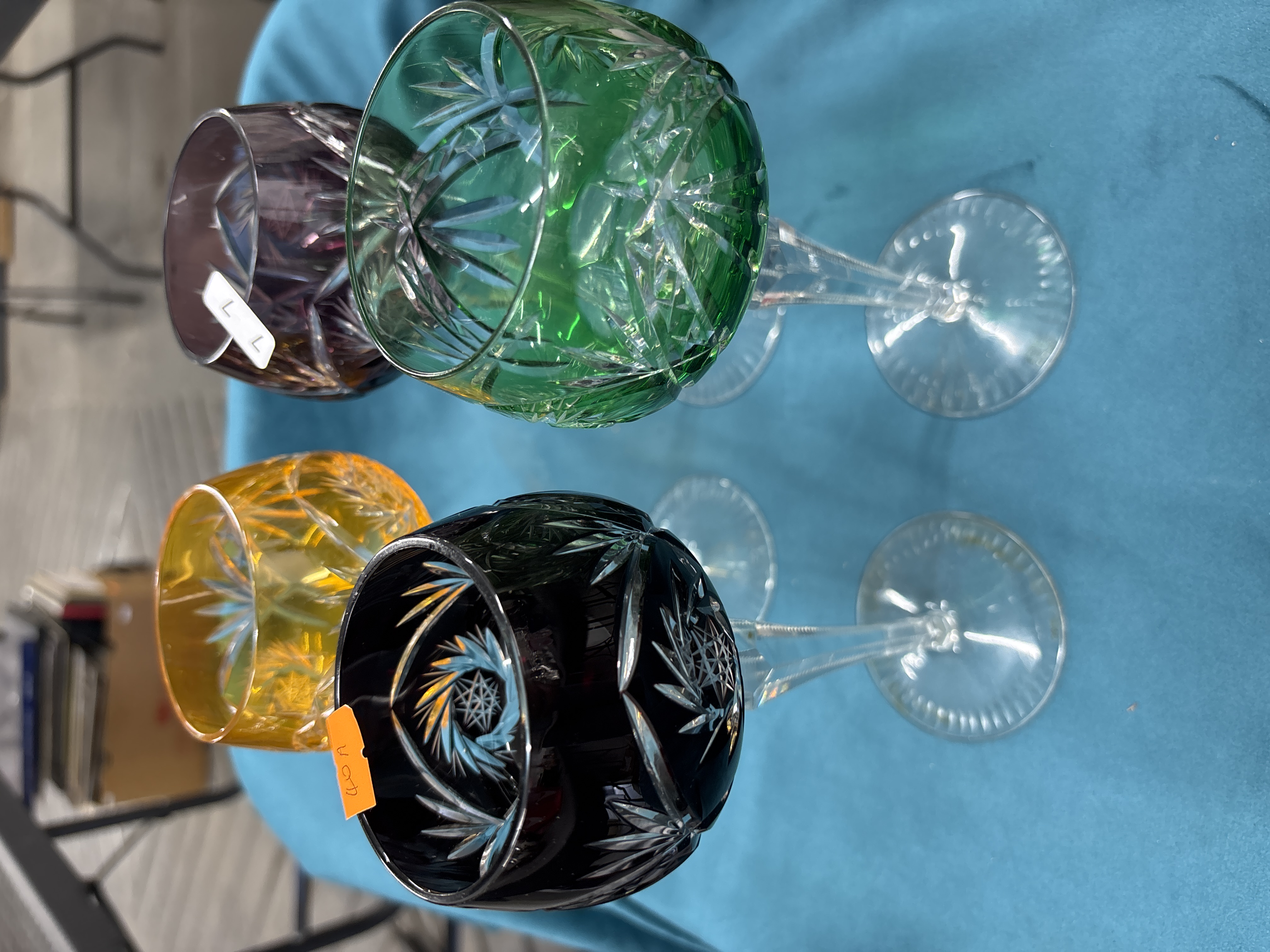 A Set of Four Multi-Coloured Cased and Cut-to-Clear Lead Crystal Hock Wine Glasses