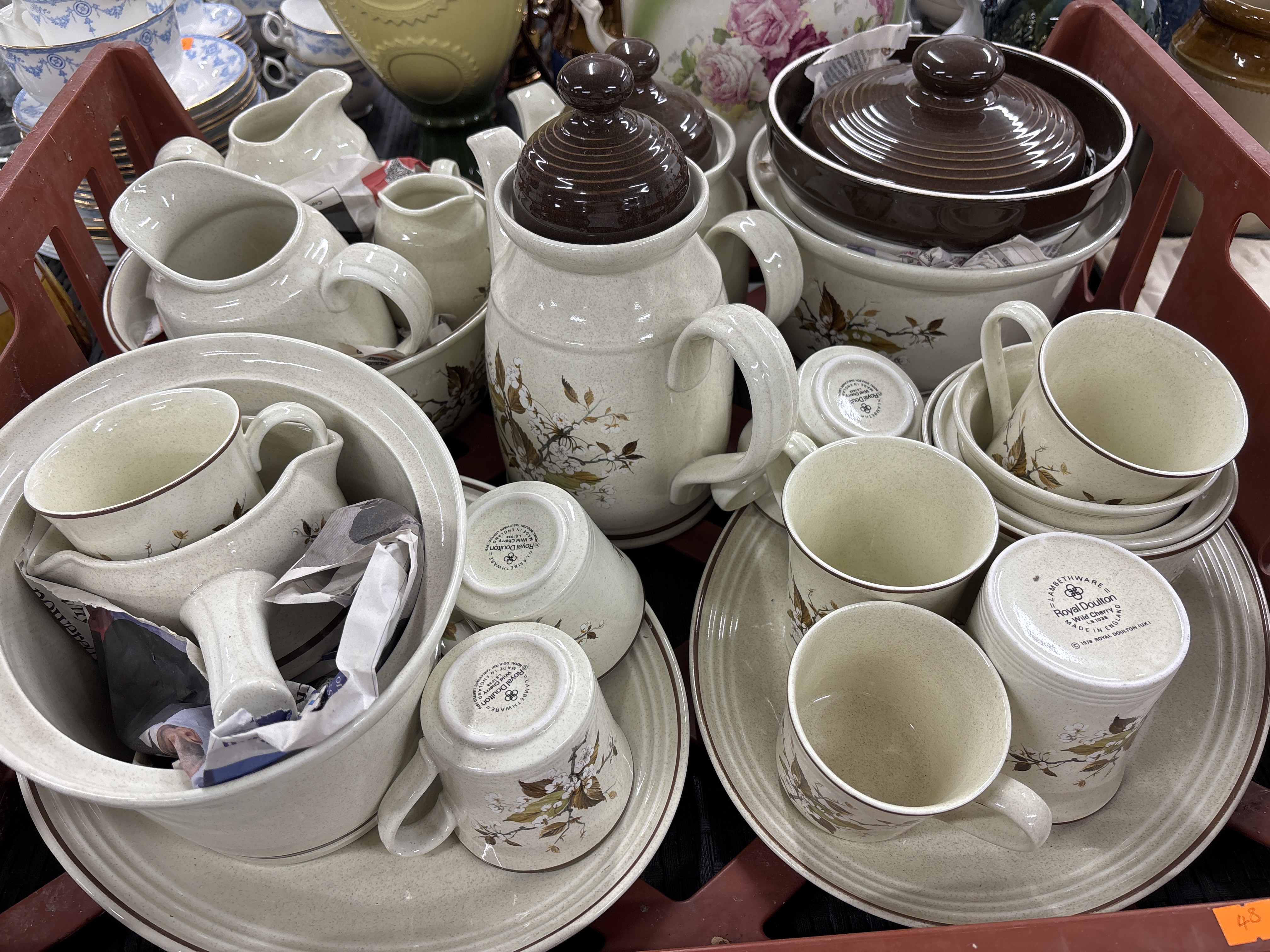 A collection of Royal Doulton Lambethware Wild Cherry pattern stoneware table service items