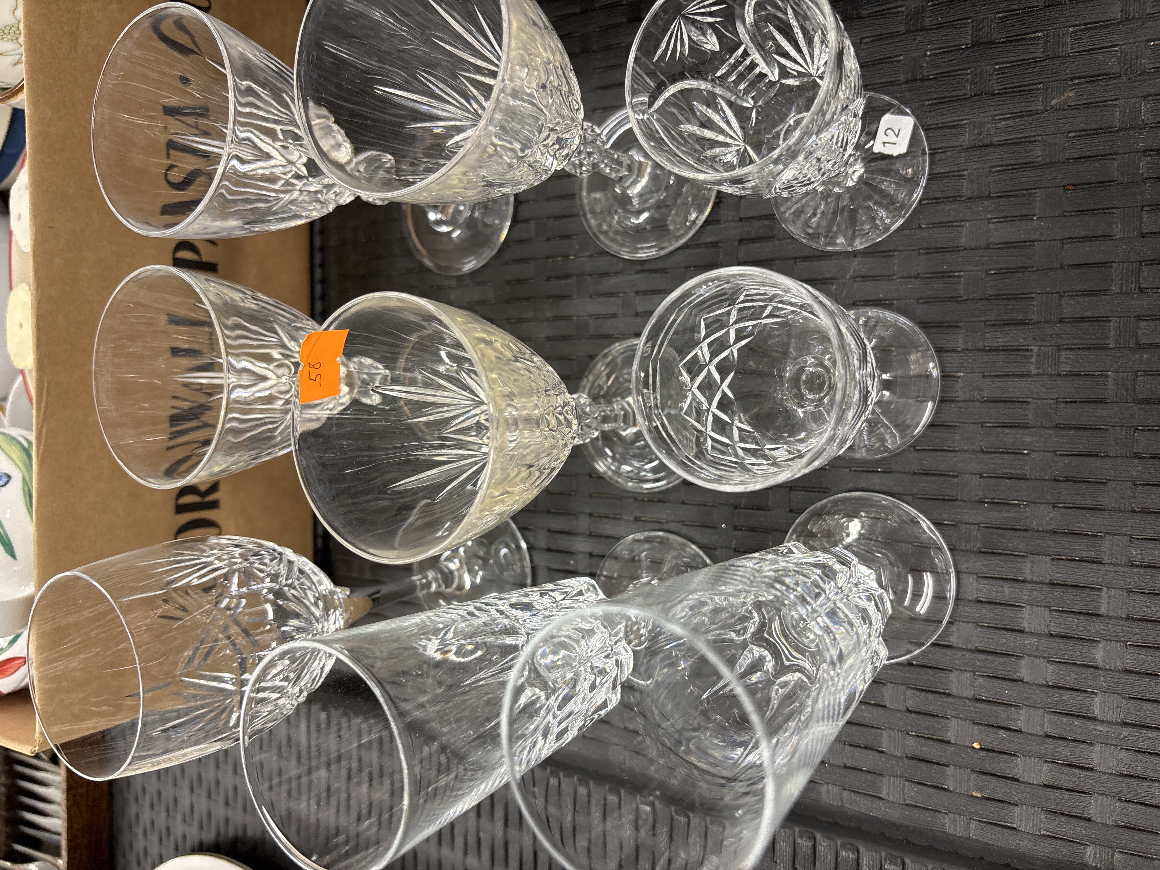An Assortment of Cut Crystal Stemware including Wine Glasses and Champagne Flutes