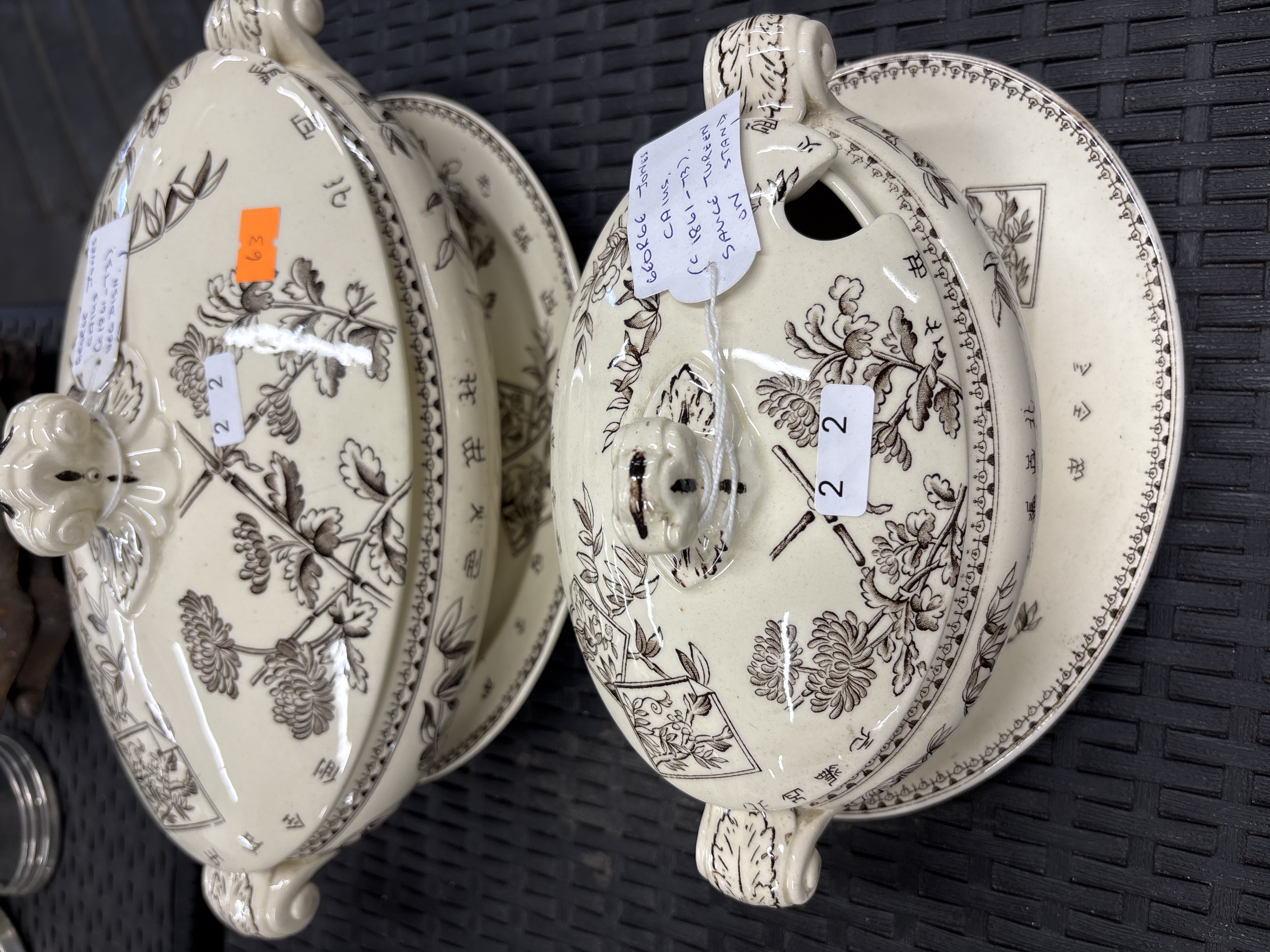 A Pair of George Jones Caius Pattern Earthenware Tureens with Stands