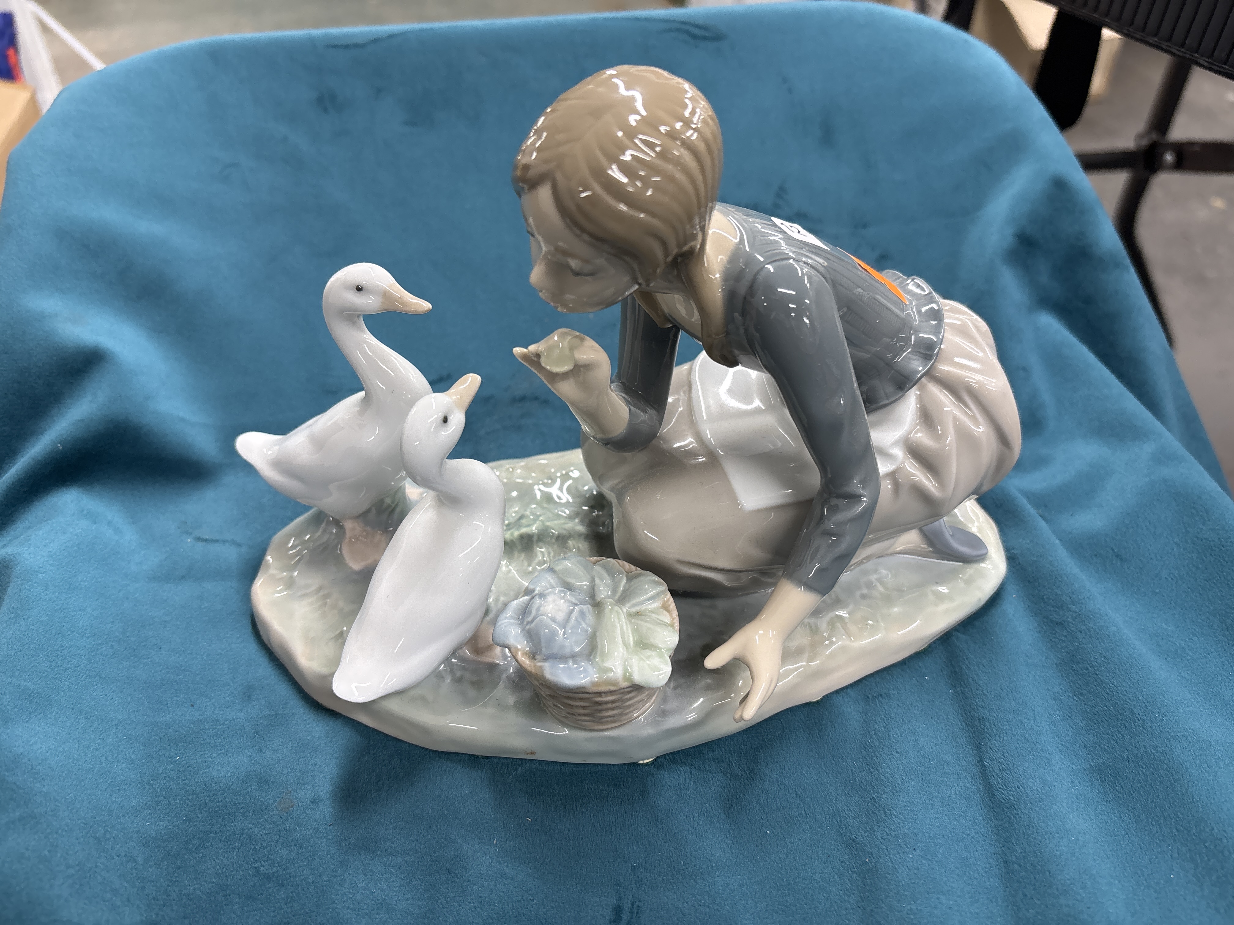 A Lladro Glazed Porcelain Figurine Girl with Geese Model 4849