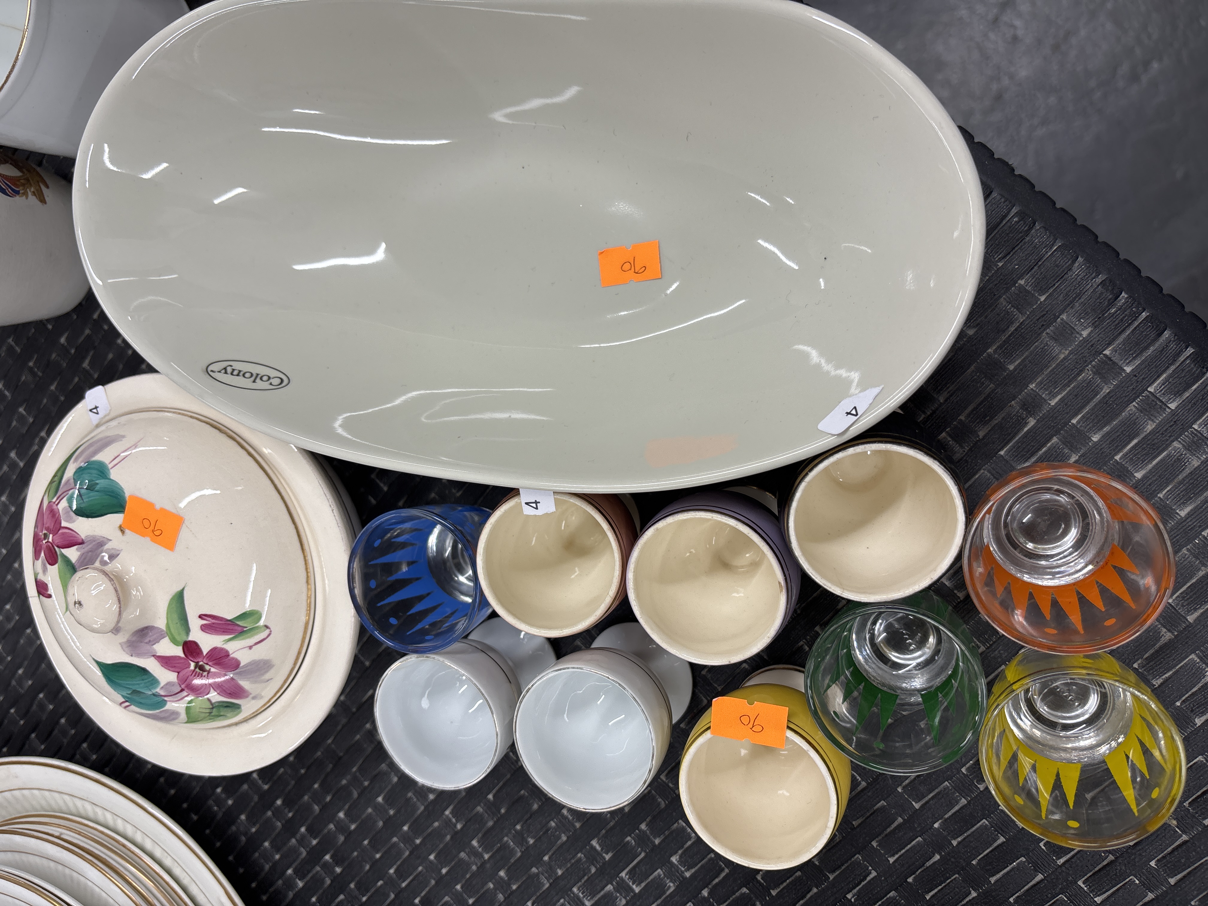 A collection of ceramic and glass tablewares including a Colony platter and floral tureen