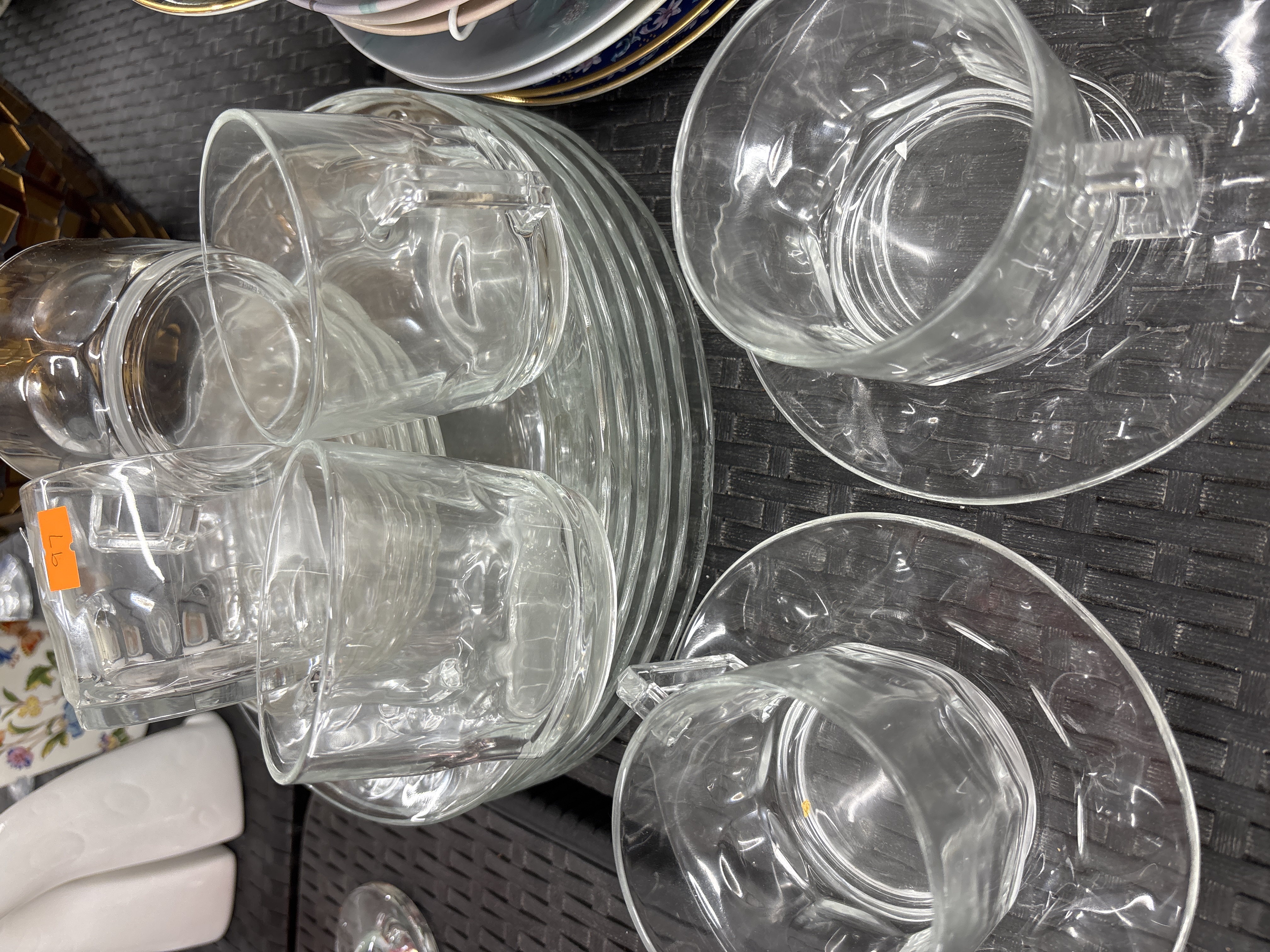 A Set of Clear Pressed Glass Cups and Saucers