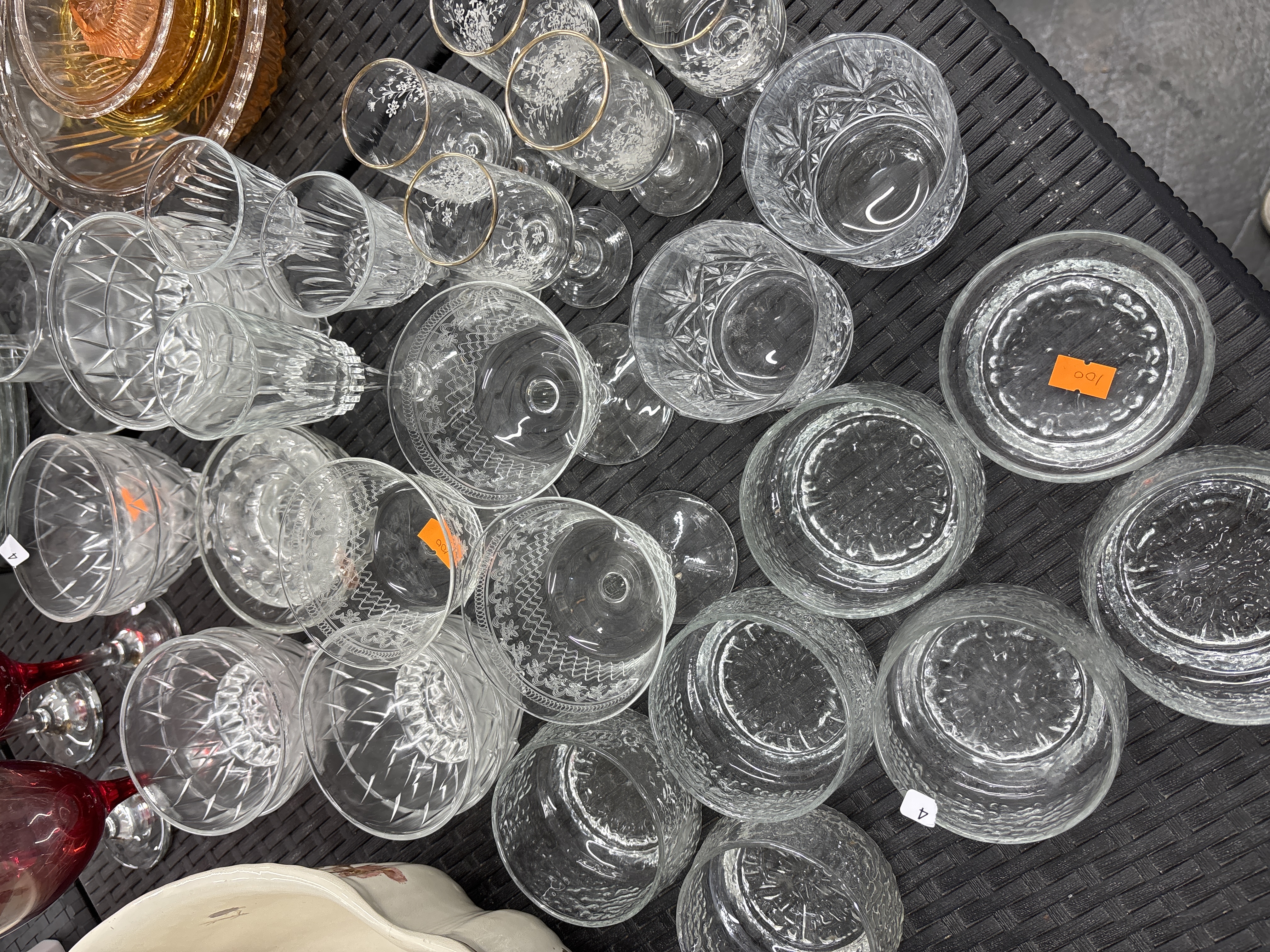 An Assortment of Cut Crystal, Etched, and Coloured Glassware