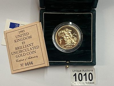 A cased 1993 United Kingdom £5 Brilliant Uncirculated Gold Coin, 22ct, 39.94g