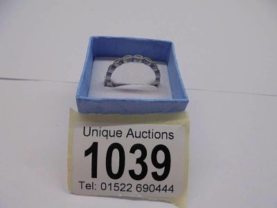 A platinum 12 stone stylish diamond ring size R, 3.85 grams.