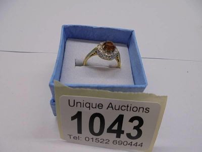 An 18ct Morganite and Diamond yellow gold ring, size J, 3.3 grams.