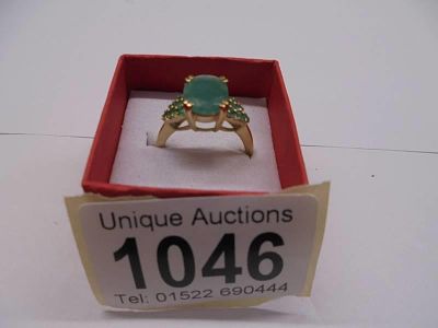 A high carat yellow gold large emerald ring, size M, 3.68 grams.