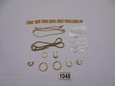 A pair of gold sleepers together with assorted yellow metal chains etc.,