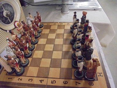A cowboy and Indian chess set,(Rex Games hand painted) with board.