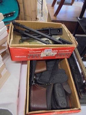 A quantity of rifle slings, bipods, butt plates etc.,